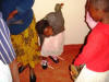 Girl receiving shoes