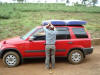 Johnny unloading mattress from Trena's car