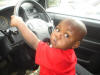 Godfrey driving Trena's car