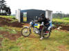 Tyson with his new brothers riding on motorcycle used as taxi