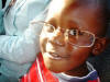 Joshua wearing Janice's glasses